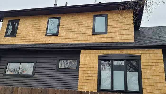 Cedar siding repair project completed by Klasek Painting