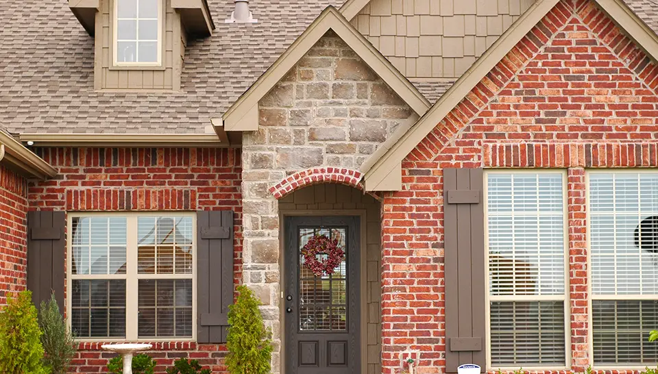 Front exterior of red brick house