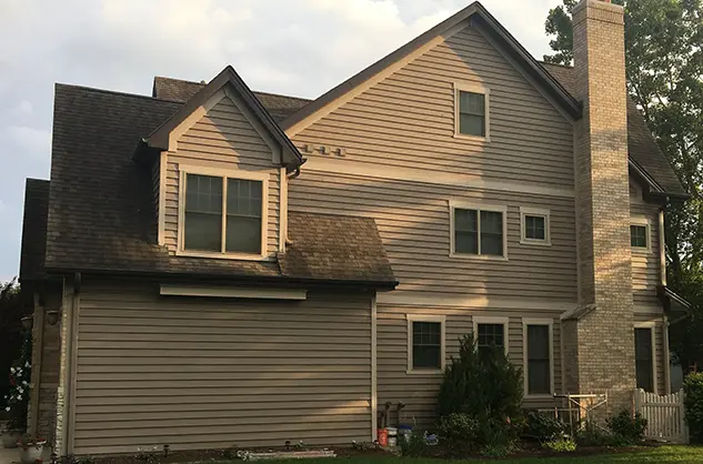 Vinyl siding repair project by Klasek Painting